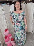 green off-the-shoulder maxi dress